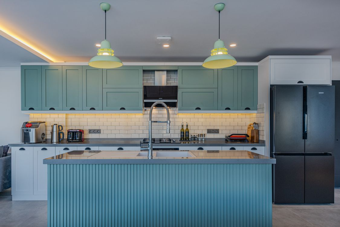 Navy blue painted kitchen cabinets