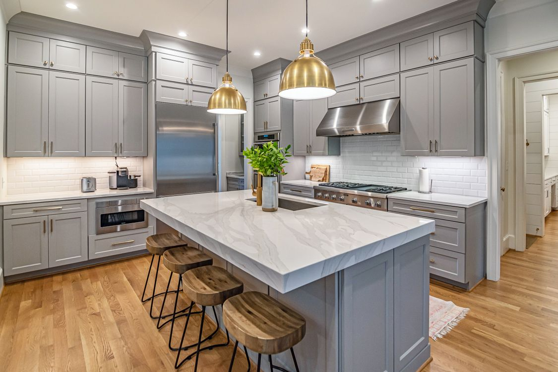 Gray painted kitchen island with white shaker cabinets, cabinet painting inspiration for Delmar, NY kitchens